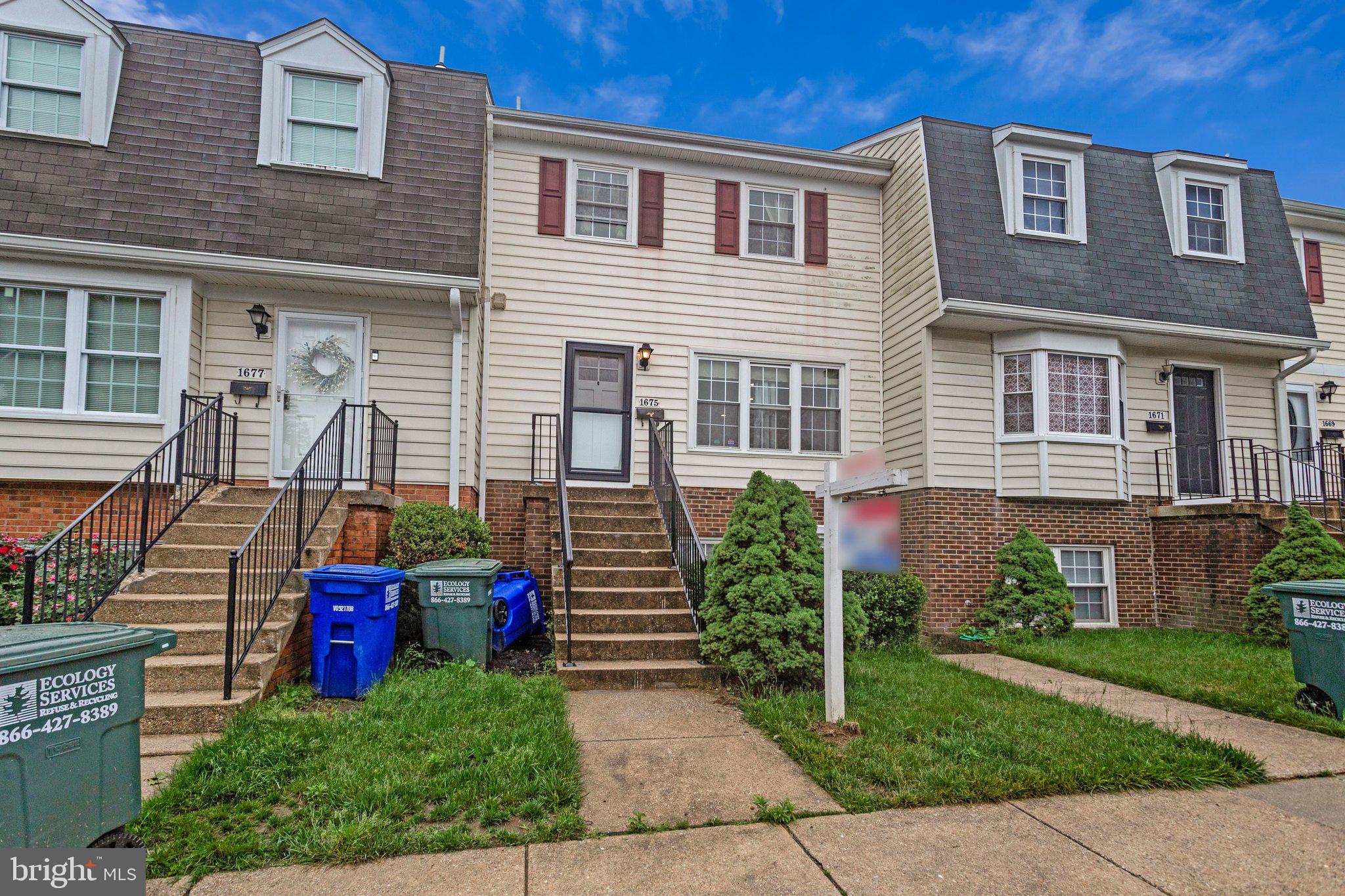 1675 Ridgely Court, Unit 182 Crofton, MD 21114 - Photo 13 of 47 a view of a house with wooden fence