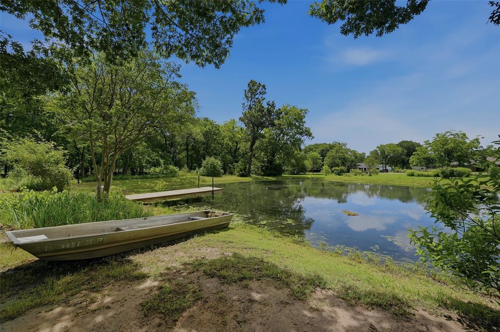 522 High Country Road Sherman, TX 75092 - Photo 34 of 38 a view of lake with a yard