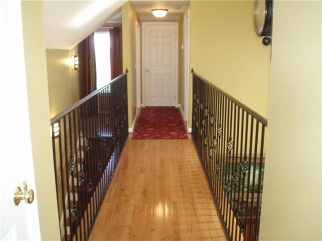 7112 Deer Ridge Road Fairview, TN 37062 - Photo 14 of 20 Open hall way upstairs that overlooks living room and entry way