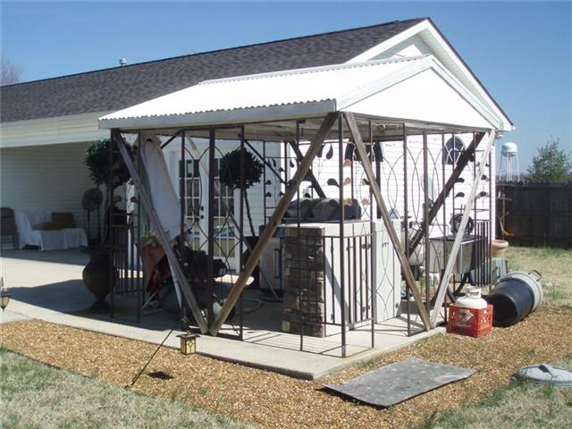 7112 Deer Ridge Road Fairview, TN 37062 - Photo 17 of 20 a close look at the pool house and patio area that surrounds it