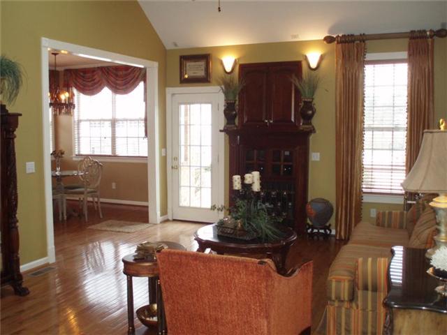 7112 Deer Ridge Road Fairview, TN 37062 - Photo 5 of 20 Looking into the Living Room and the beautiful Cherry Wood Fireplace