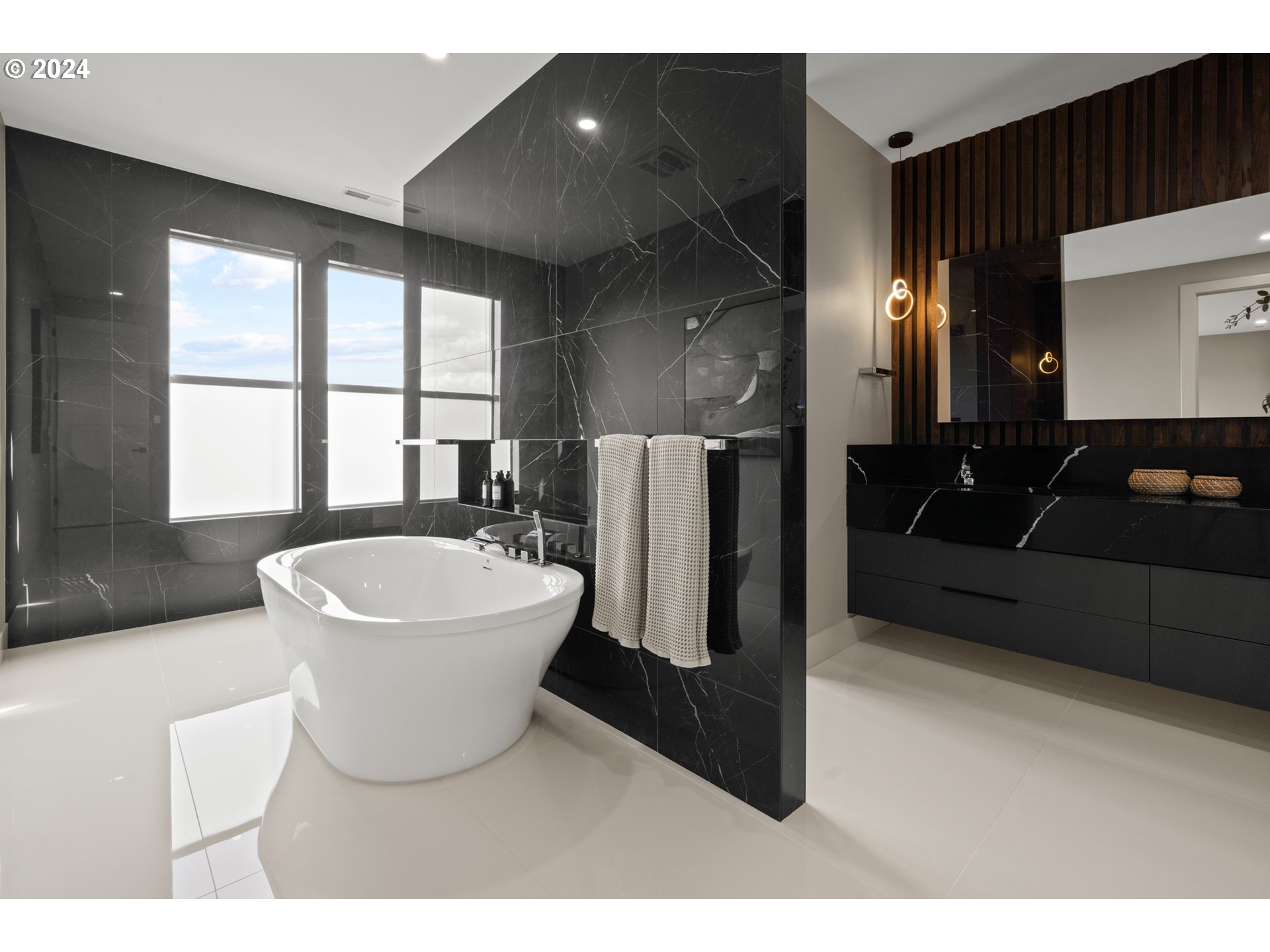 512 Province Drive Camas, WA 98607 - Photo 25 of 46 a living room with a couch and a large window