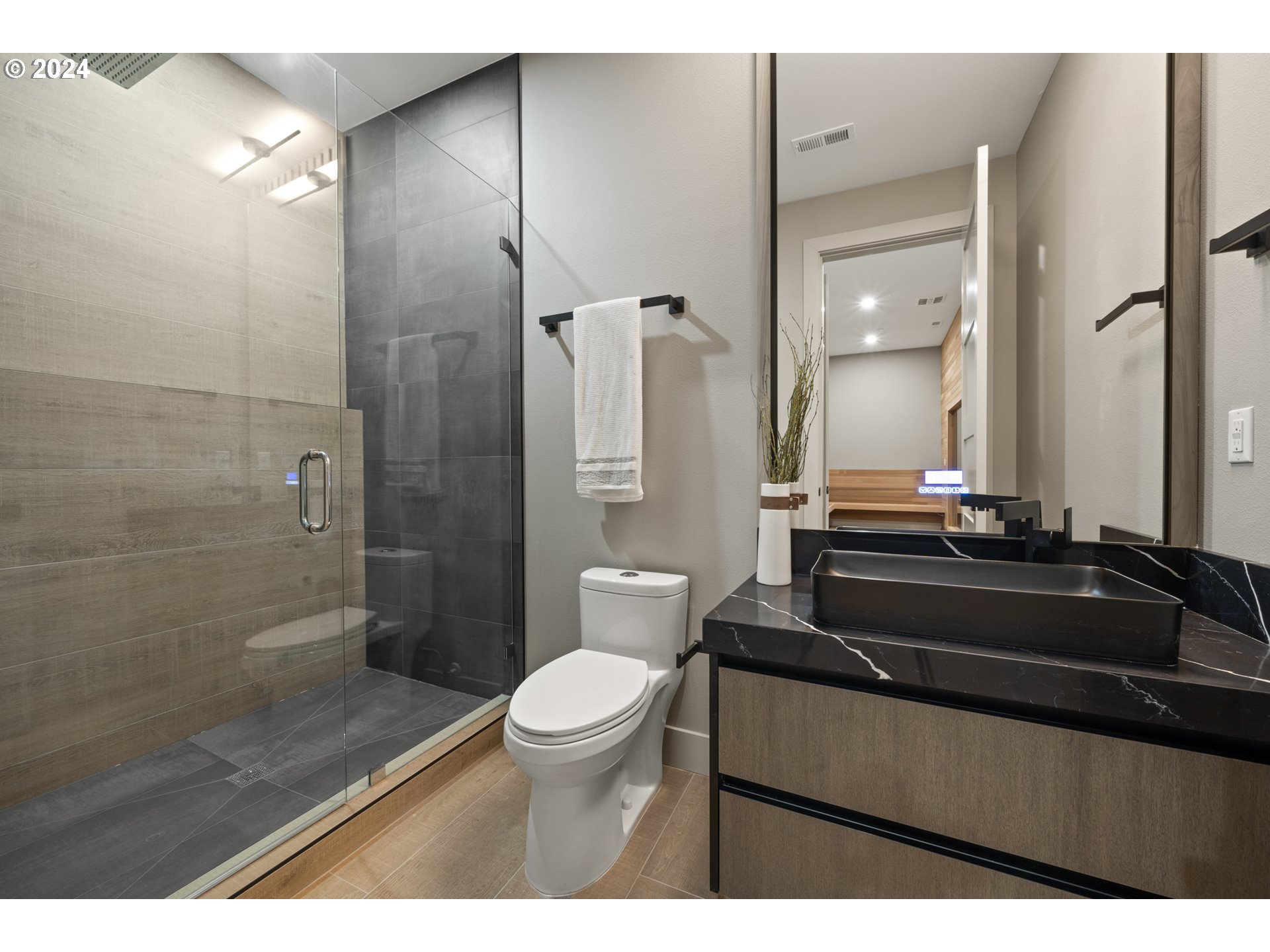 512 Province Drive Camas, WA 98607 - Photo 39 of 46 a bathroom with a sink a toilet a shower and a mirror