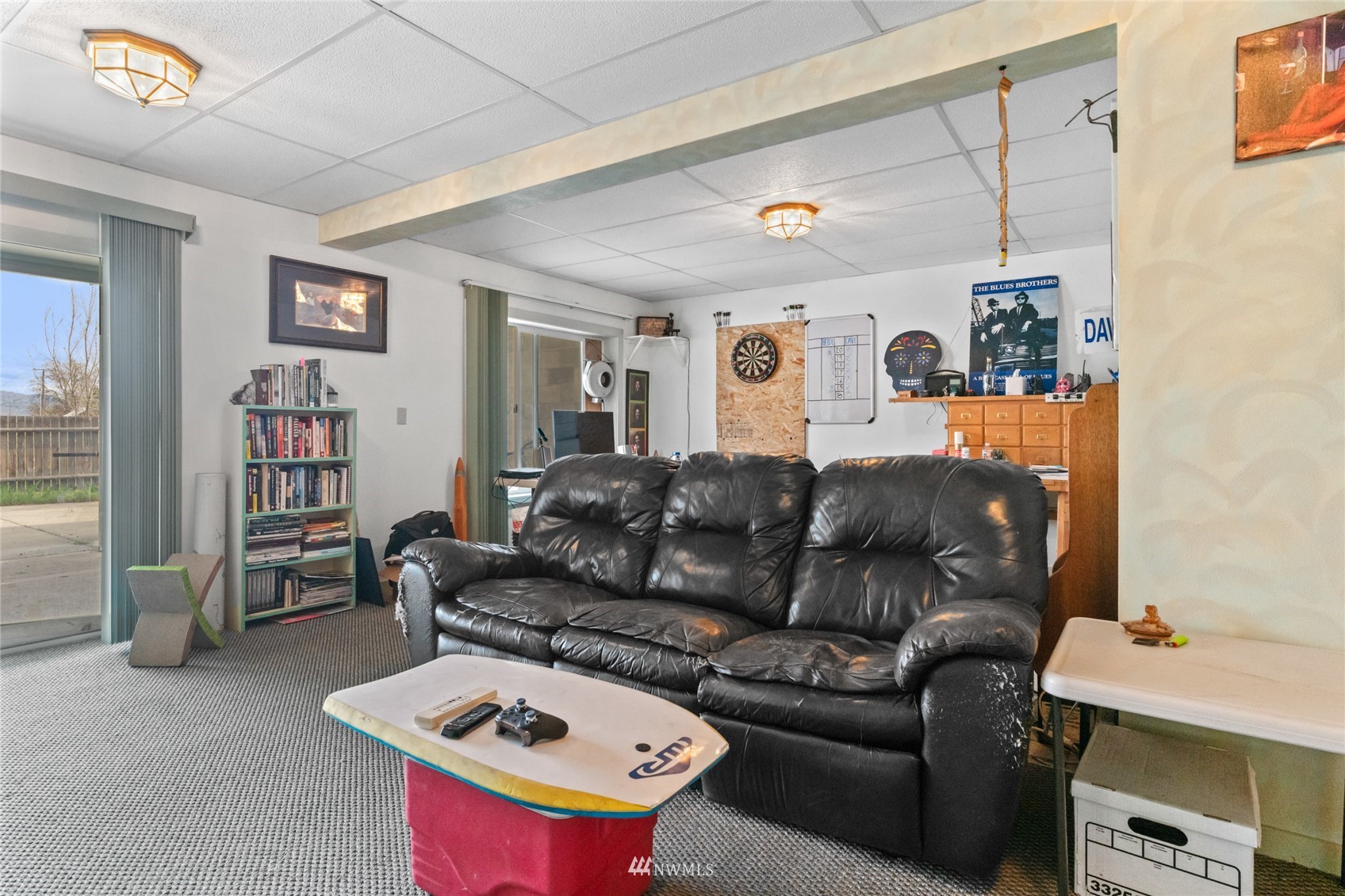 1 George Road Omak, WA 98841 - Photo 26 of 38 a living room with furniture and a flat screen tv