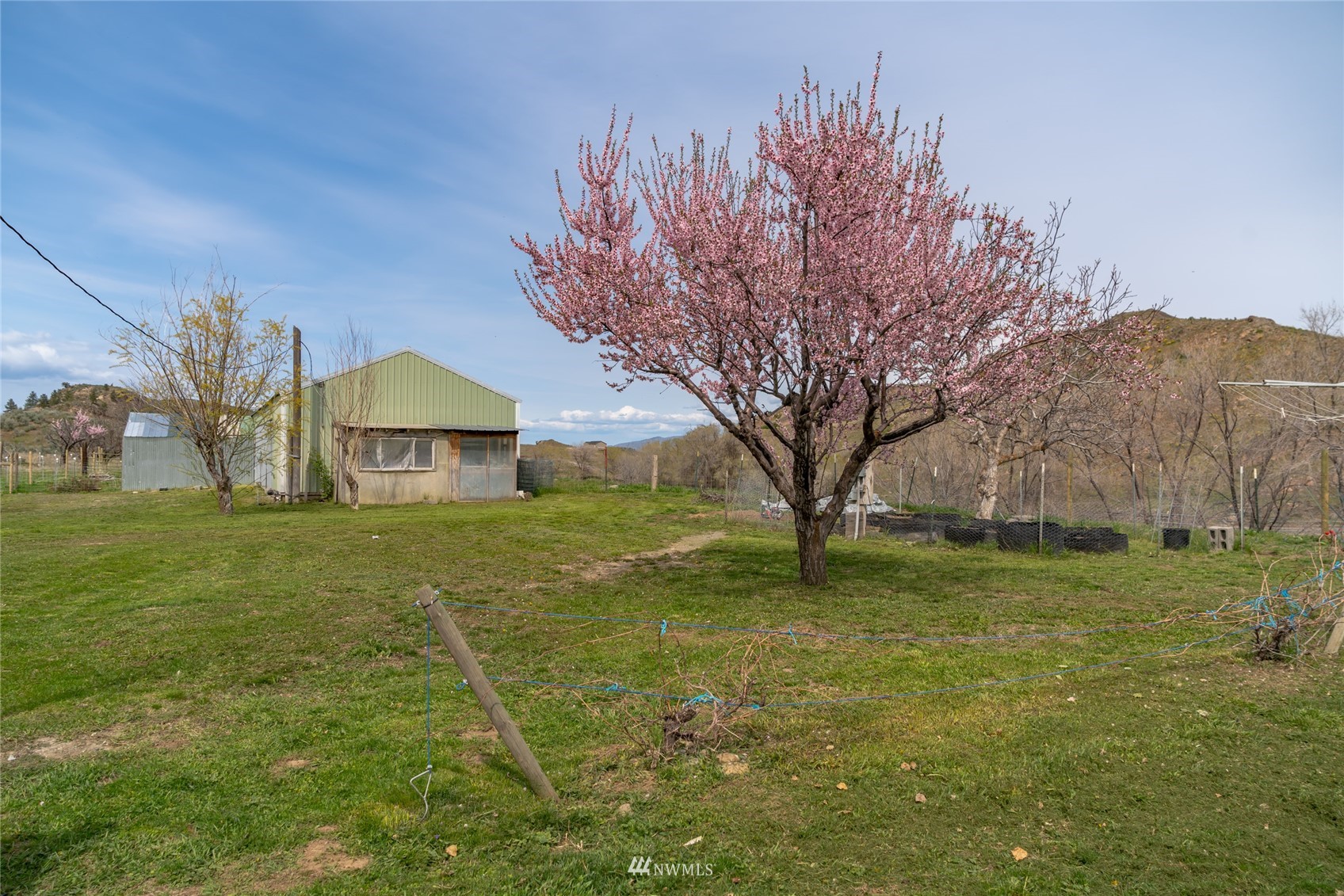 1 George Road Omak, WA 98841 - Photo 31 of 38 a view of a house with a yard