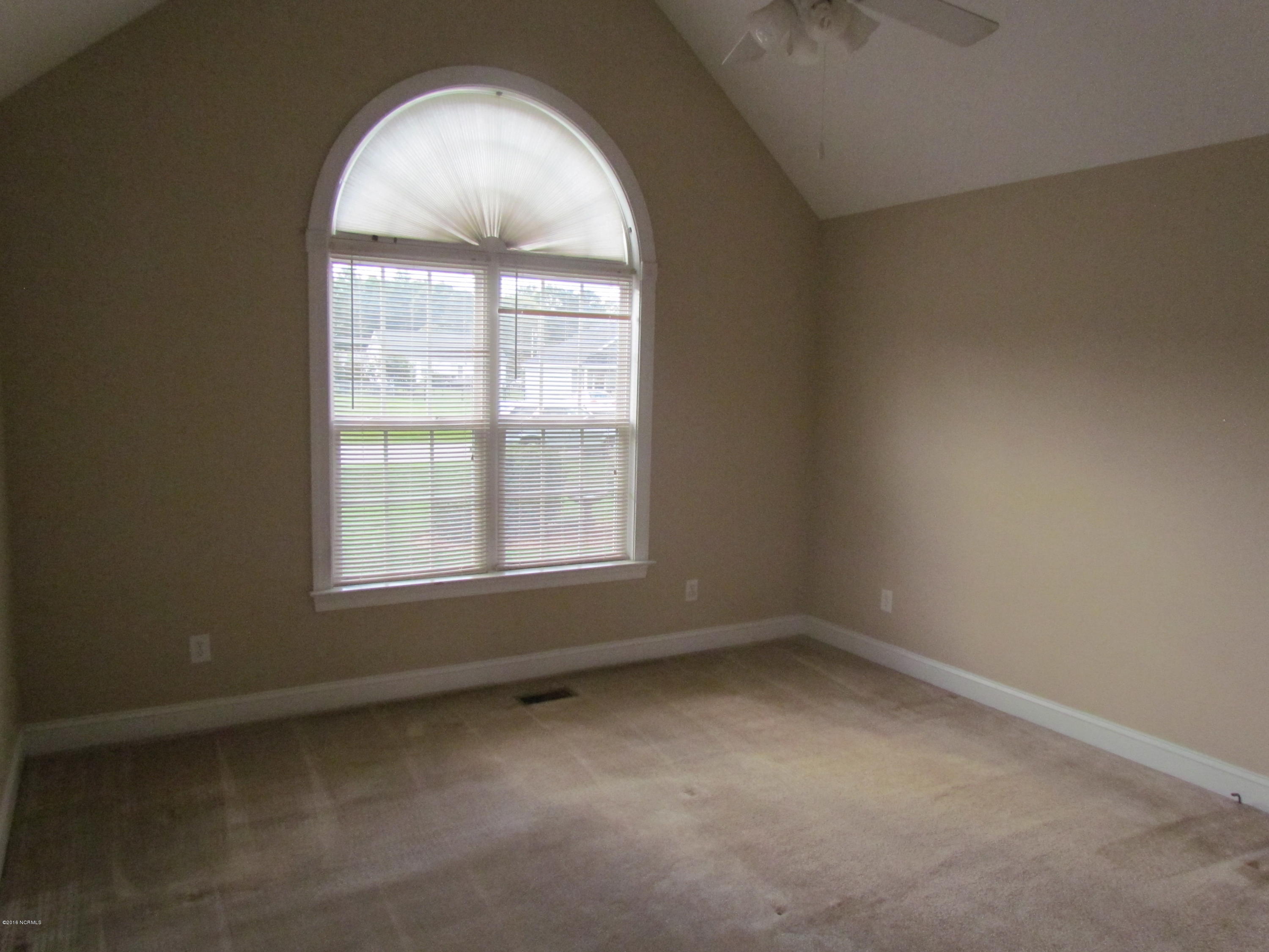 4815 Green Wing Road Wilson, NC 27893 - Photo 8 of 14 Spacious room features huge walk-in closet