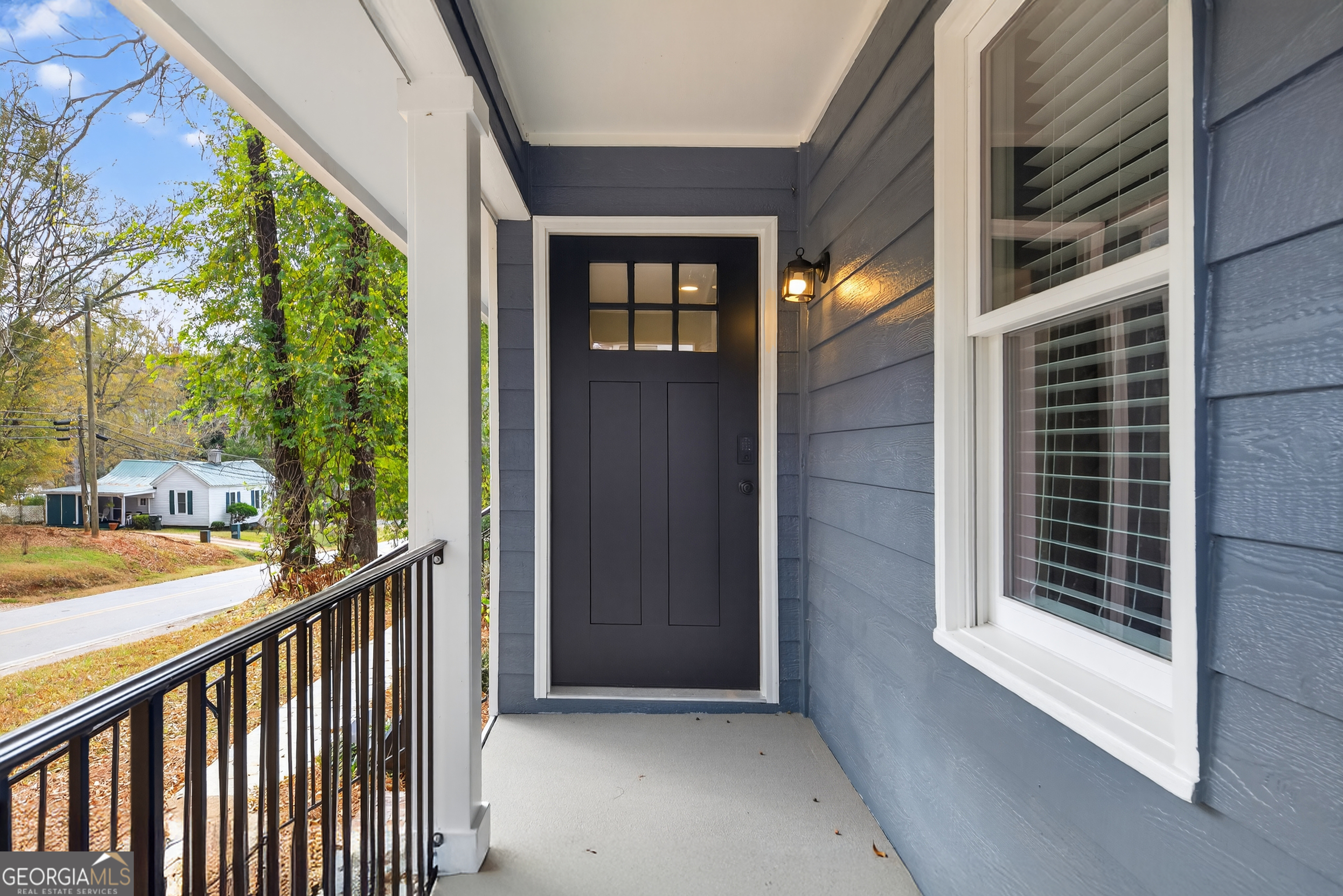 475 Vine Street, Unit B Madison, GA 30650 - Photo 4 of 23 a view of a balcony