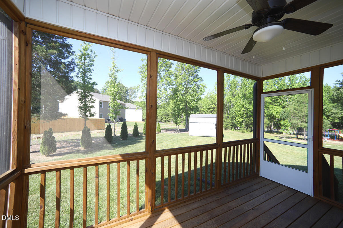 125 Mae Court Roxboro, NC 27573 - Photo 26 of 30 a view of a porch with wooden floor