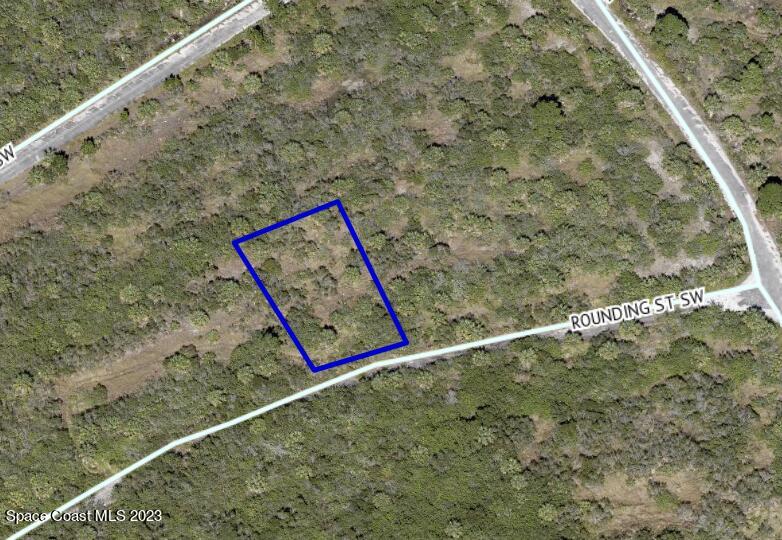 923 Rounding Street Southwest Palm Bay, FL 32908 - Photo 1 of 1 a sign that is on the wall of a building