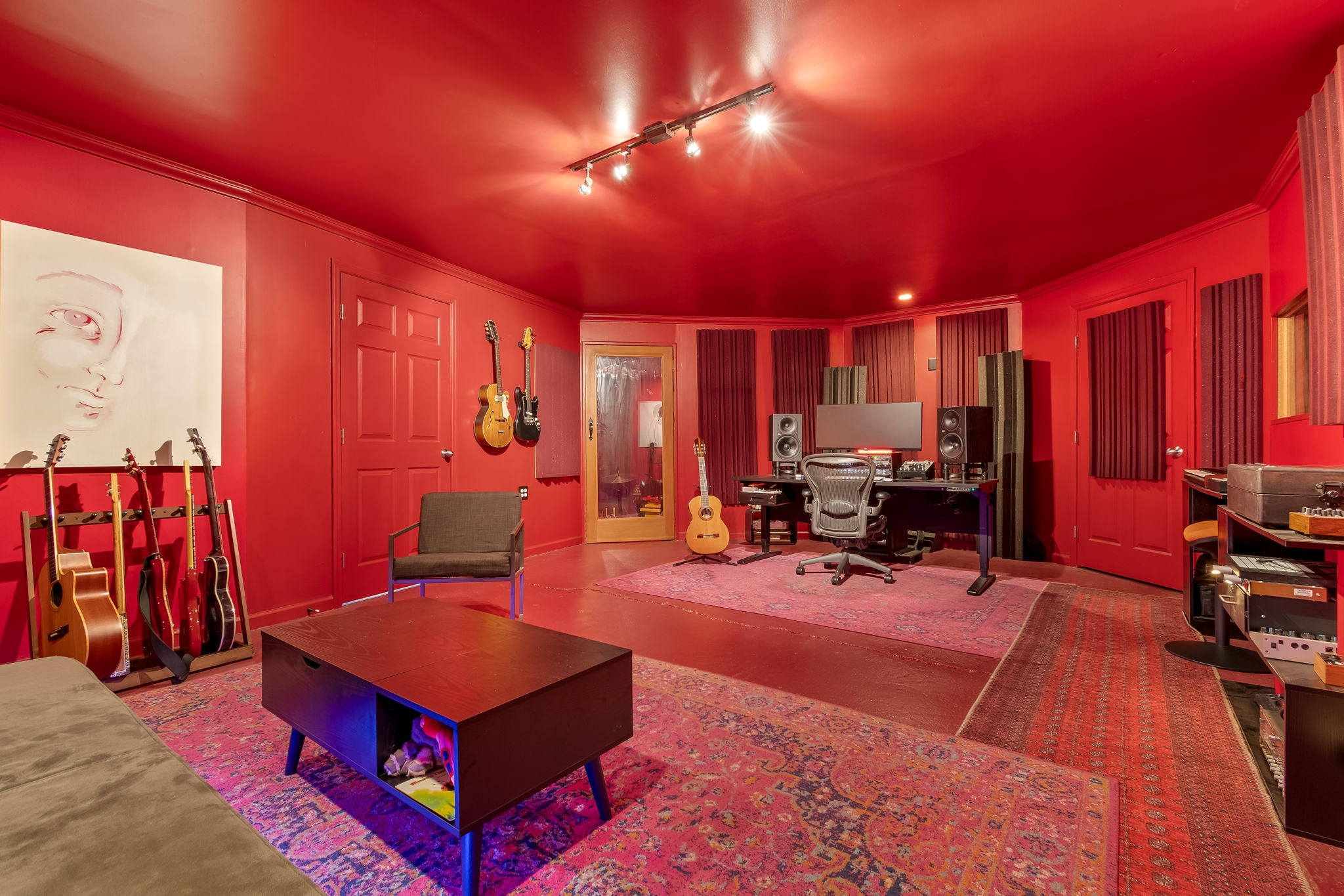 a room with furniture and a gym machine