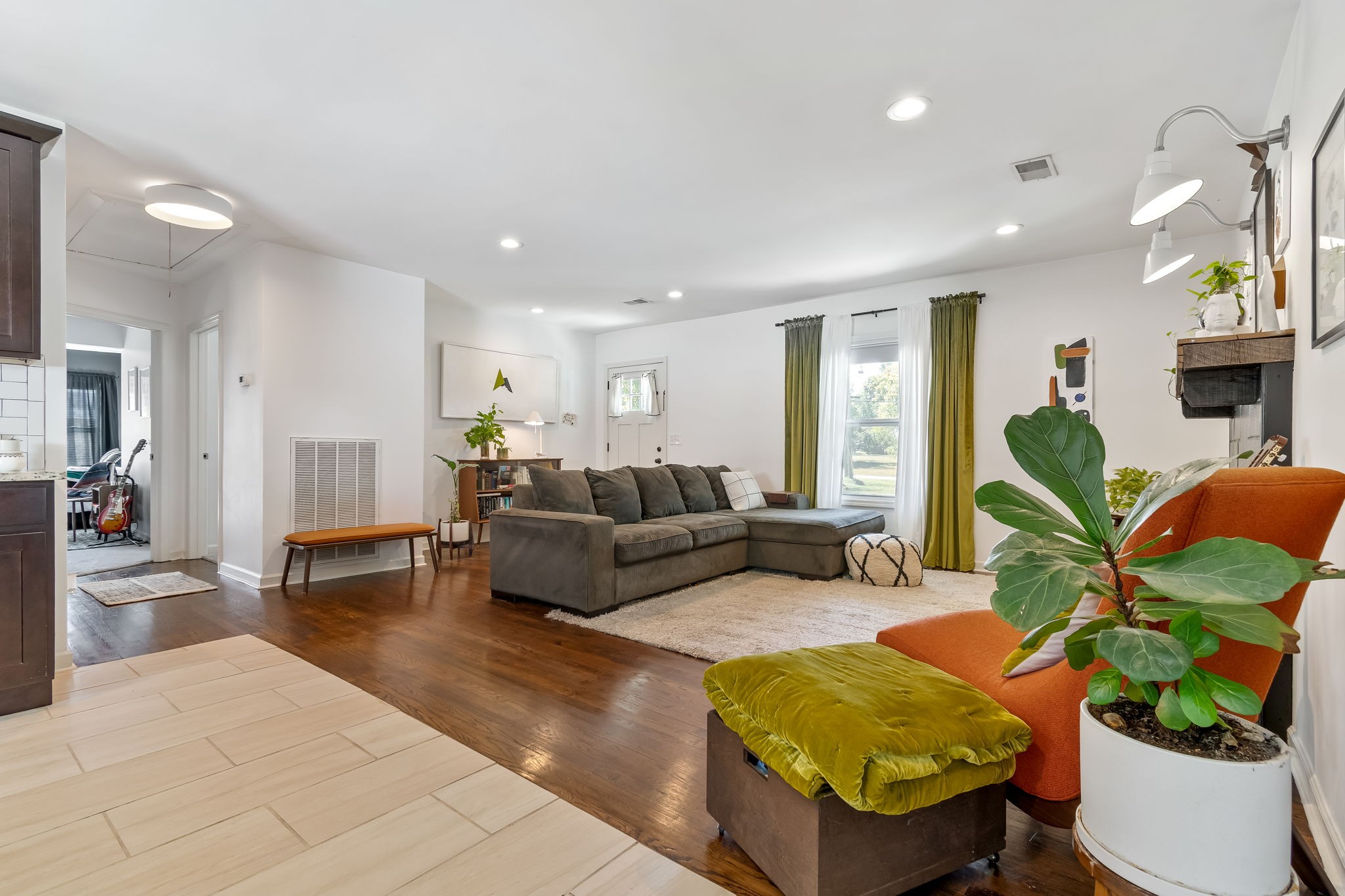 1136 Pierce Road Madison, TN 37115 - Photo 14 of 63 a living room with furniture and a potted plant