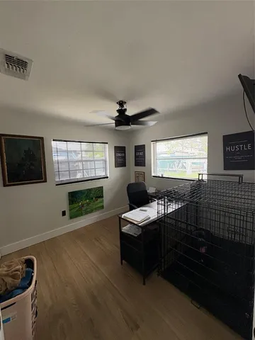 a bedroom with furniture and a window