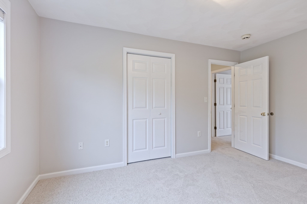 555 Main Street, Unit 10 Woburn, MA 01801 - Photo 27 of 39 a view of an empty room