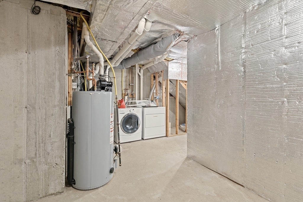555 Main Street, Unit 10 Woburn, MA 01801 - Photo 37 of 39 a utility room with dryer and washer