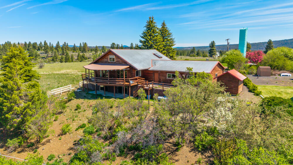 34840 Dawn Loop Chiloquin, OR 97624 - Photo 89 of 91 an aerial view of a house with a garden and lake view