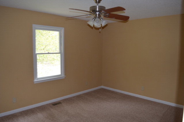 1689 Johnson Road Macon, GA 31220 - Photo 13 of 17 an empty room with a window