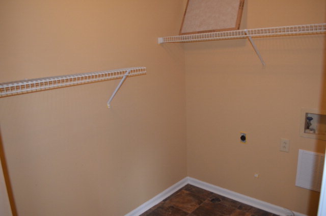 1689 Johnson Road Macon, GA 31220 - Photo 8 of 17 a view of a room with racks on the wall