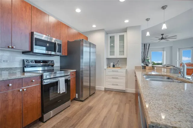 a view of living room filled with furniture