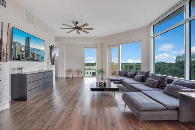 a large bed in a white room