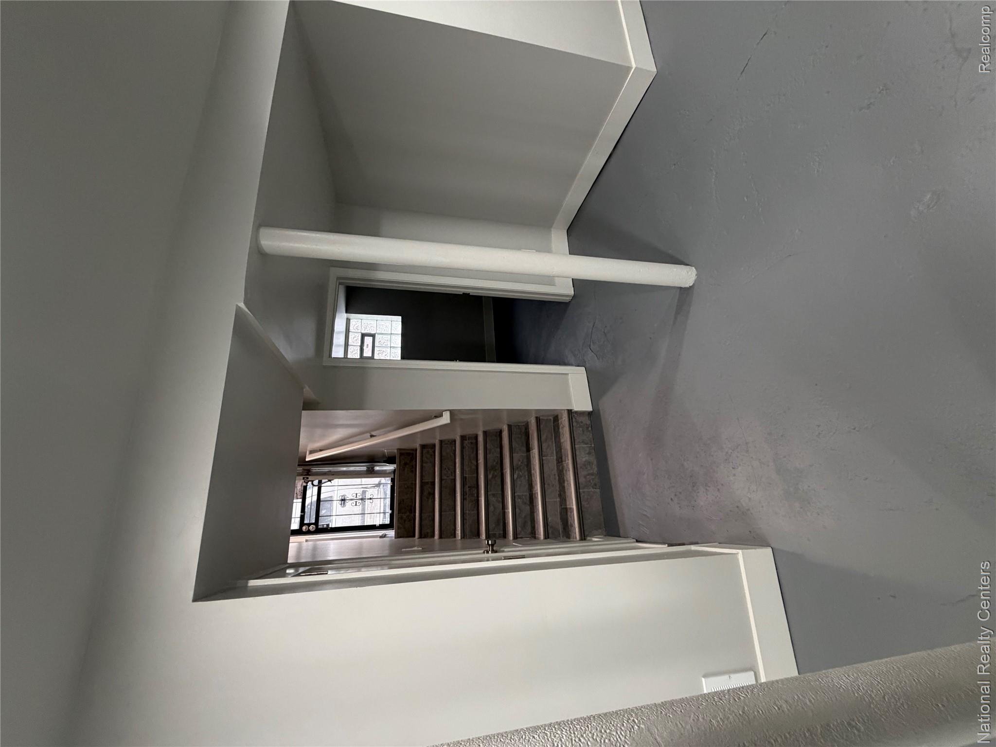 16522 Inverness Street Detroit, MI 48221 - Photo 36 of 62 Basement with baseboards and stairway