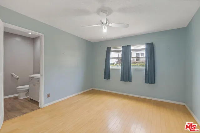 a view of empty room with windows