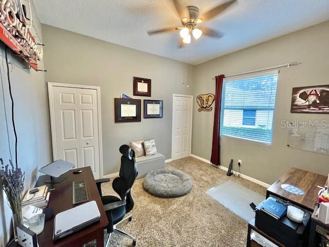 226 River Village Drive DeBary, FL 32713 - Photo 17 of 27 a bedroom with a bed and wooden floor