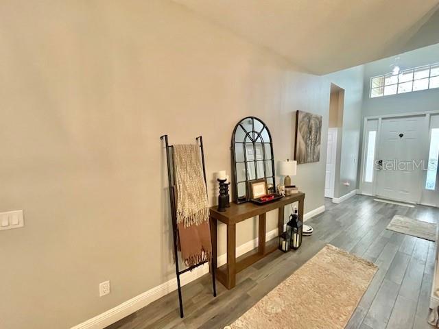 226 River Village Drive DeBary, FL 32713 - Photo 7 of 27 a view of a livingroom with furniture and staircase