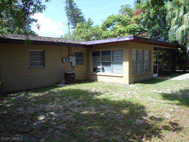 1419 Mandel Road Fort Myers, FL 33919 - Photo 17 of 18 a view of a house with a yard