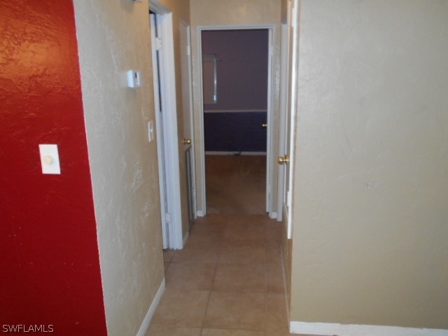 1419 Mandel Road Fort Myers, FL 33919 - Photo 7 of 18 a view of a hallway with closet