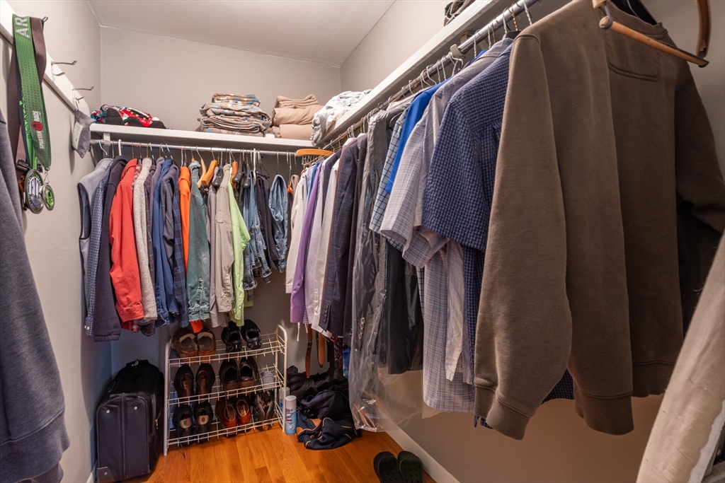 21 Nova Road Nashua, NH 03064 - Photo 17 of 30 a view of walk in closet with clothes