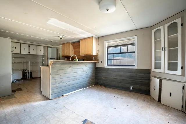 a room with furniture and a window