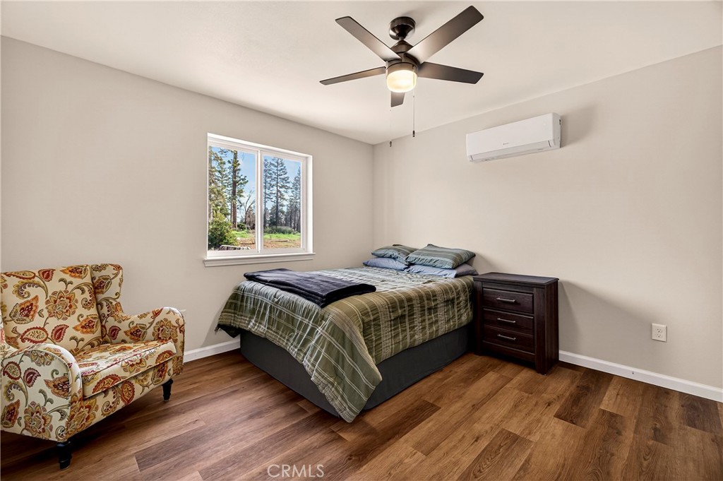 6352 Tahoe Court Paradise, CA 95969 - Photo 19 of 61 a bedroom with a bed and window