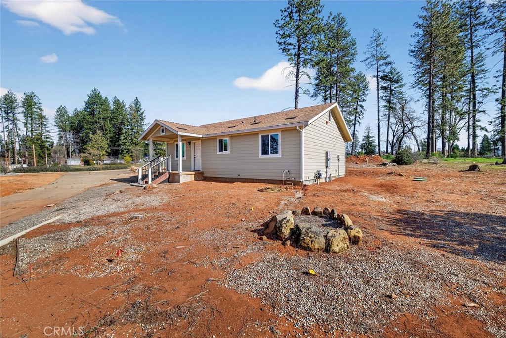 6352 Tahoe Court Paradise, CA 95969 - Photo 4 of 61 a backyard of a house with table and chairs