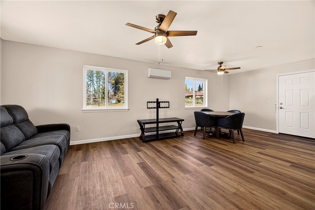 6352 Tahoe Court Paradise, CA 95969 - Photo 8 of 61 a living room with furniture and a wooden floor