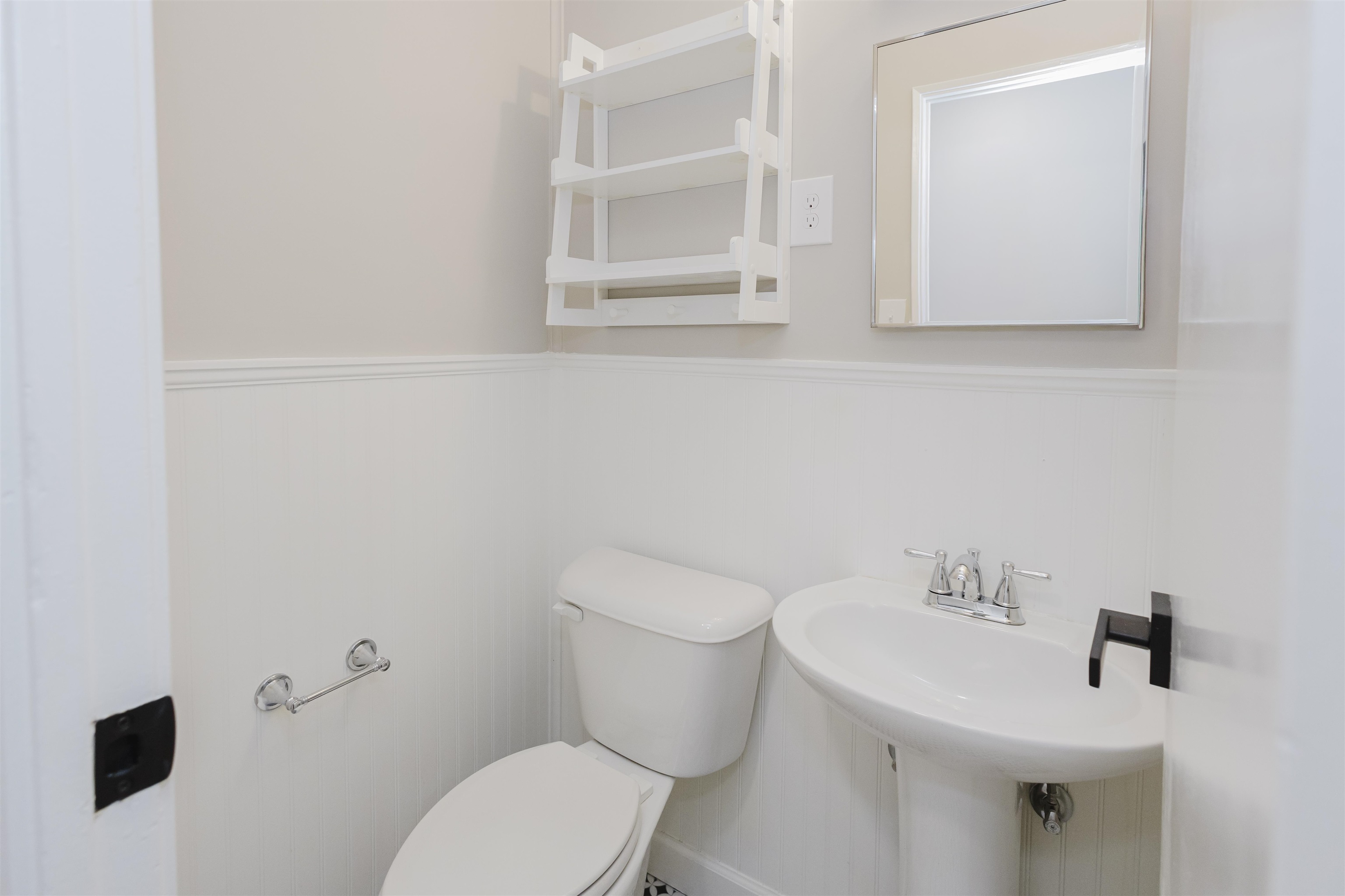 421 McDermitt Road Memphis, TN 38120 - Photo 13 of 23 a bathroom with a sink mirror and toilet