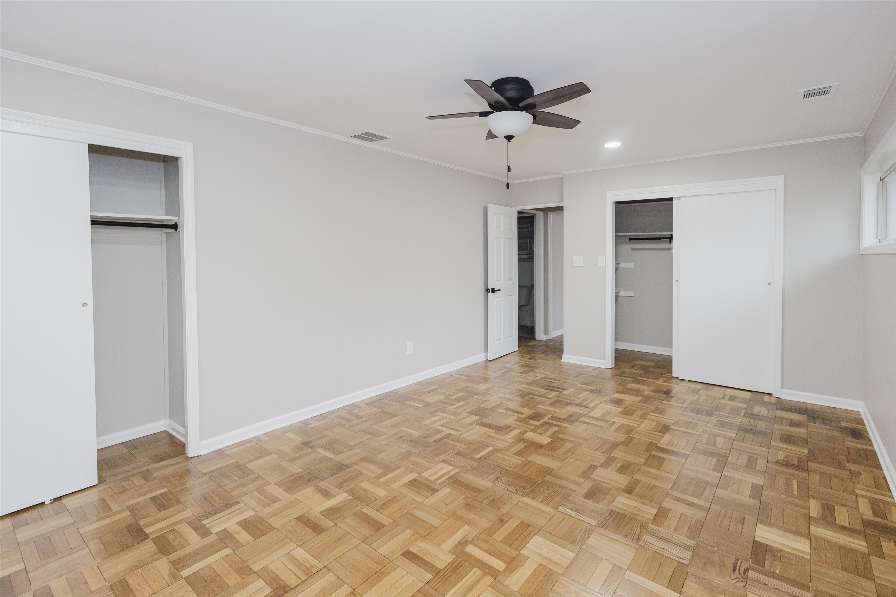 421 McDermitt Road Memphis, TN 38120 - Photo 16 of 23 a view of an empty room and chandelier fan