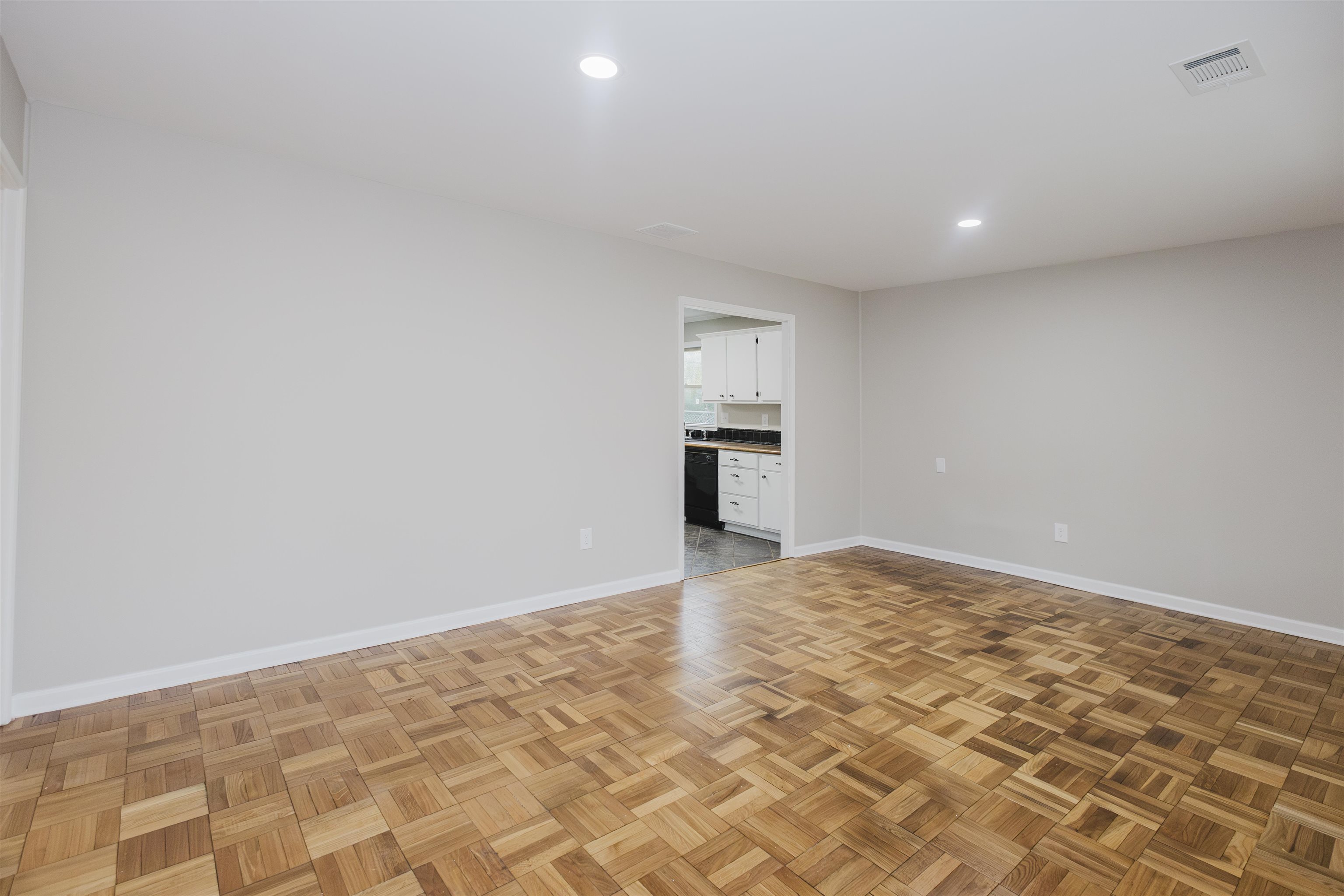 421 McDermitt Road Memphis, TN 38120 - Photo 4 of 23 a view of empty room with wooden floor