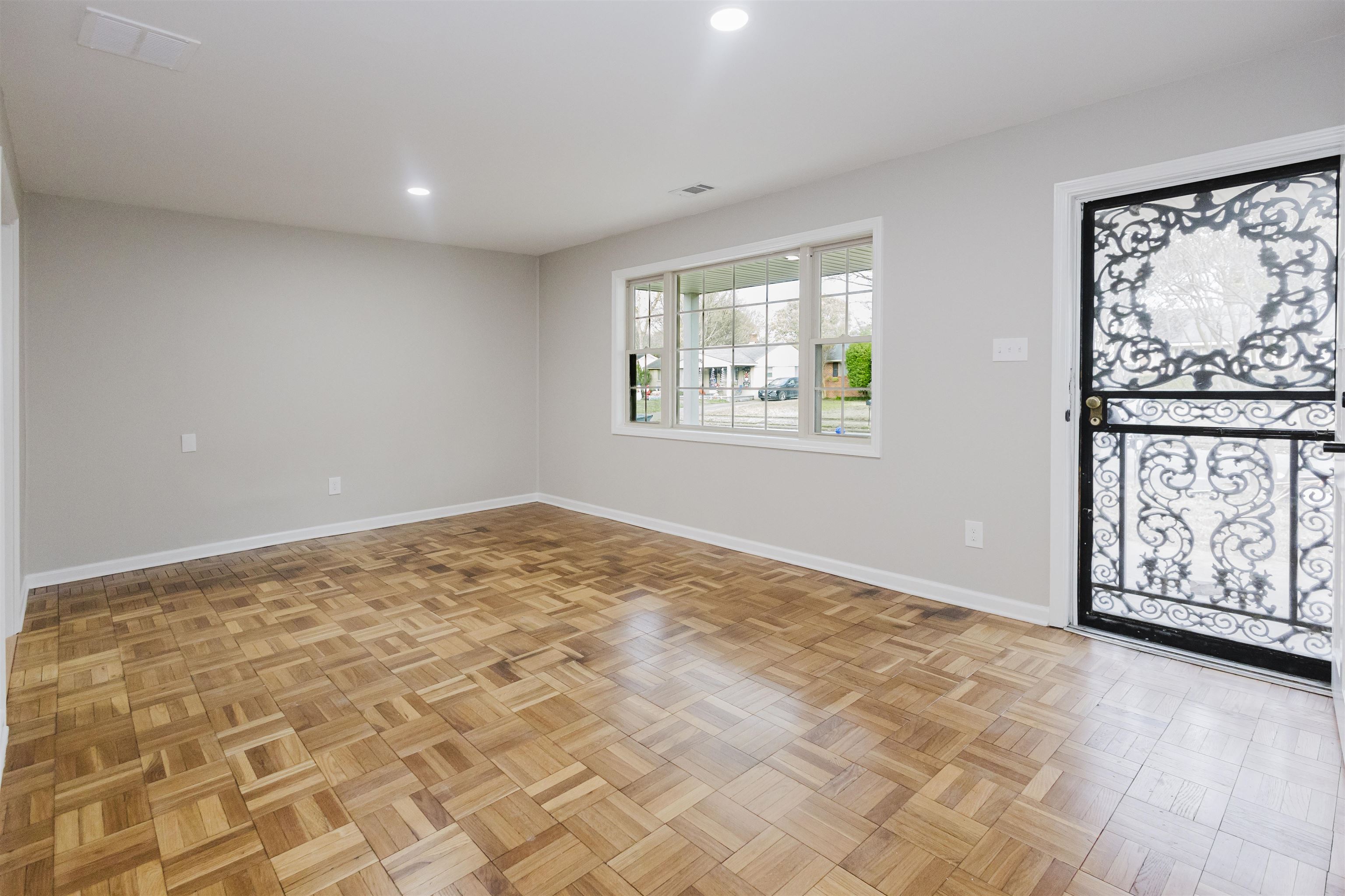 421 McDermitt Road Memphis, TN 38120 - Photo 5 of 23 a view of an empty room and window