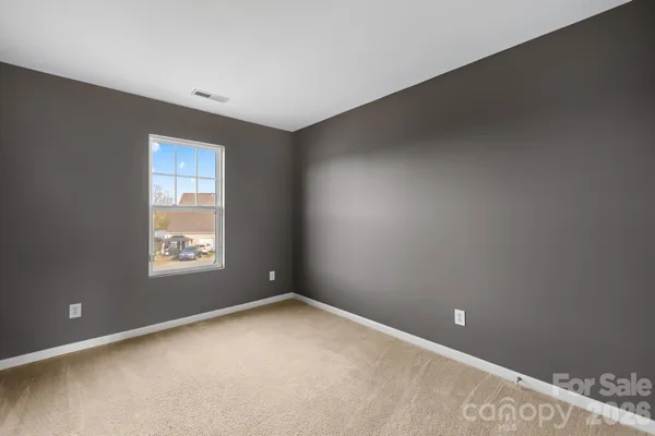 a view of a storage and utility room with stairs