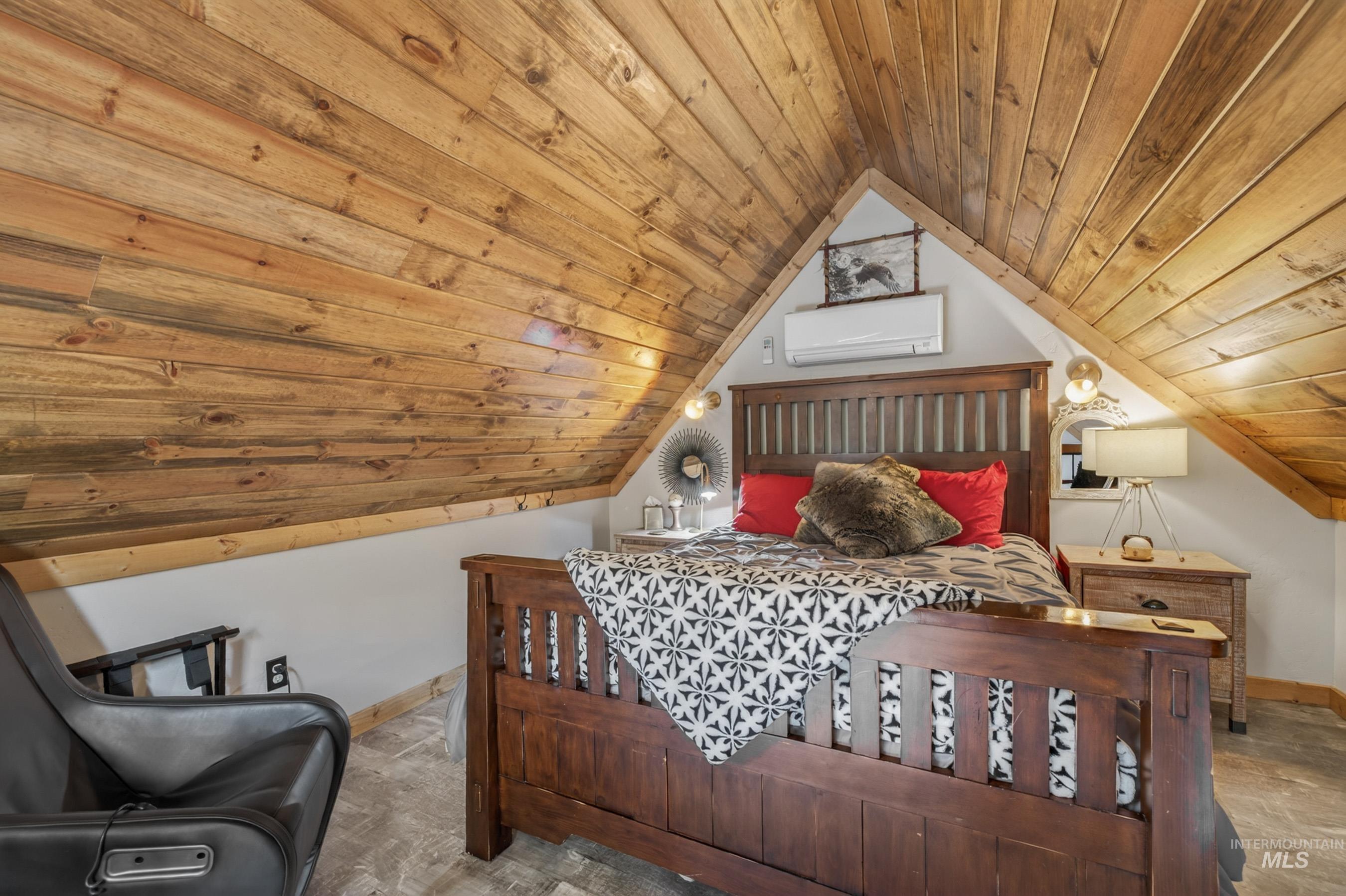 1432 Salmon Drive Riggins, ID 83549 - Photo 24 of 39 Wood-paneled sloped ceiling with a white accent wall