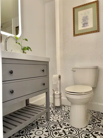 a bathroom with a toilet and a sink