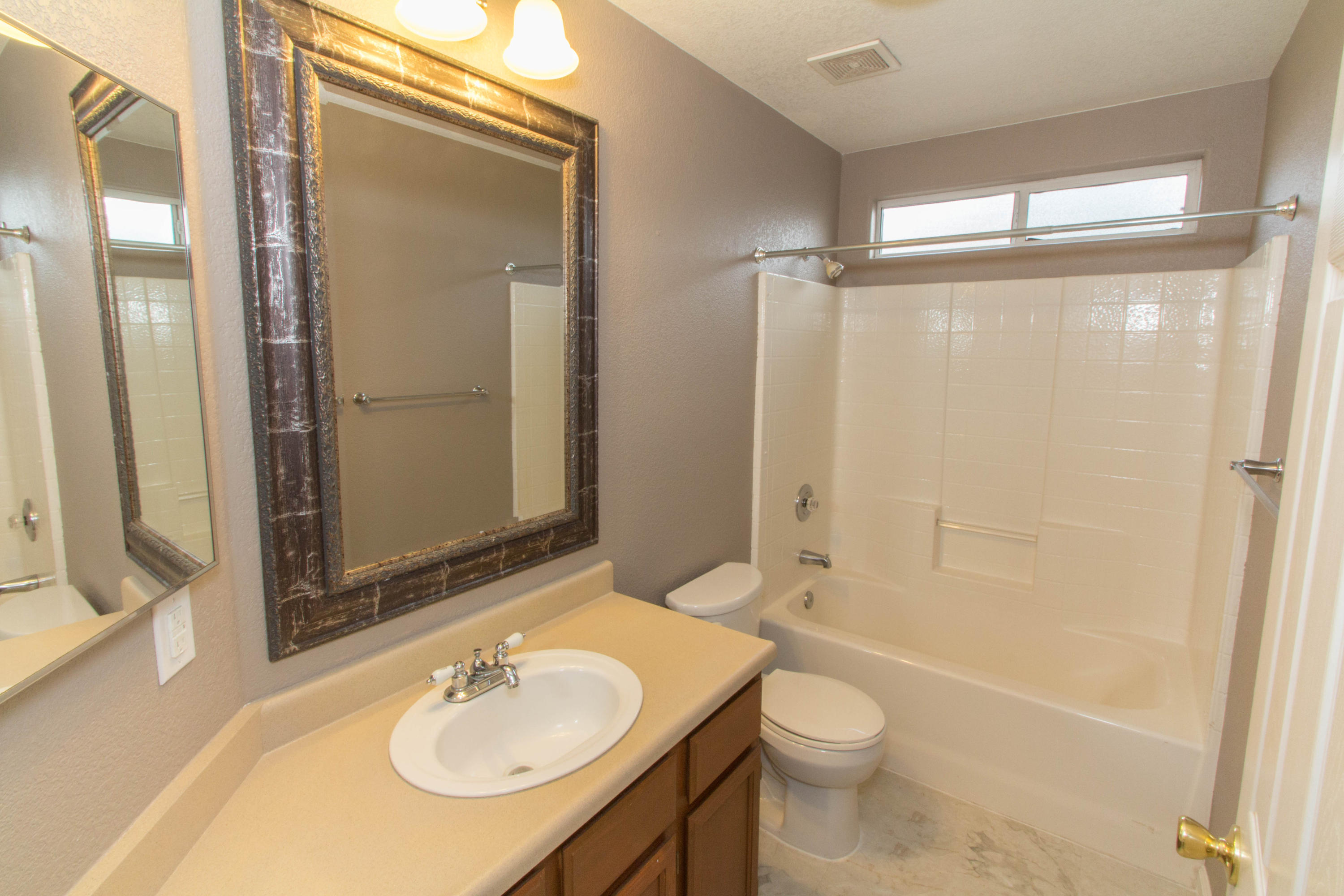 3357 Lawrence Road Redding, CA 96002 - Photo 4 of 17 a bathroom with a sink toilet and shower