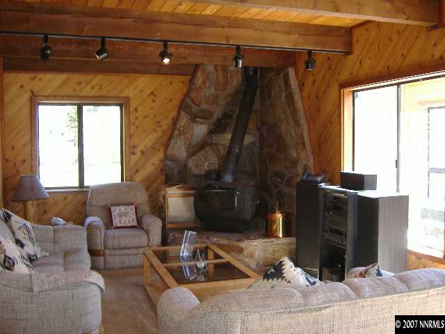 373 Maryanne Stateline, NV 89449 - Photo 3 of 9 a living room with furniture and a window