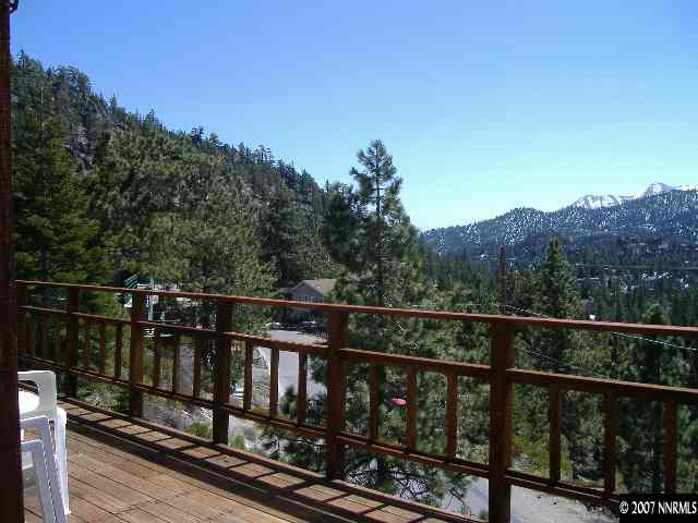 373 Maryanne Stateline, NV 89449 - Photo 9 of 9 a view of a balcony with wooden fence and floor