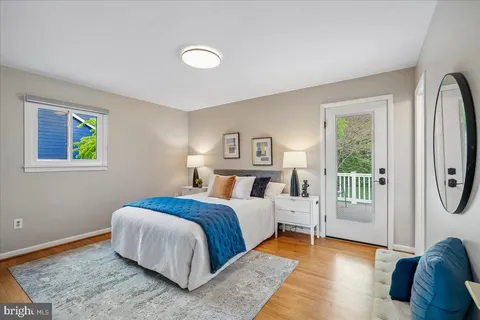 a bedroom with a bed and closet