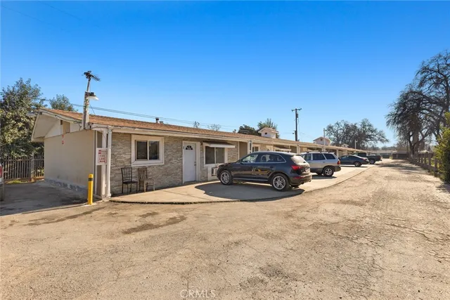 a view of a house with a snow in the yard