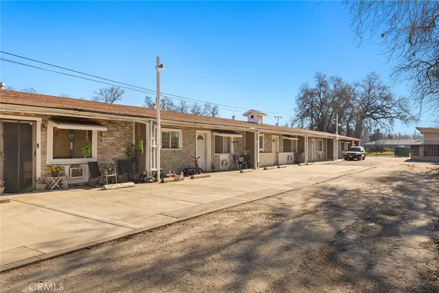 a front view of a house with a outdoor space