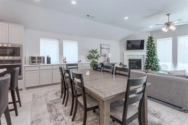 a kitchen that has a sink and a stove