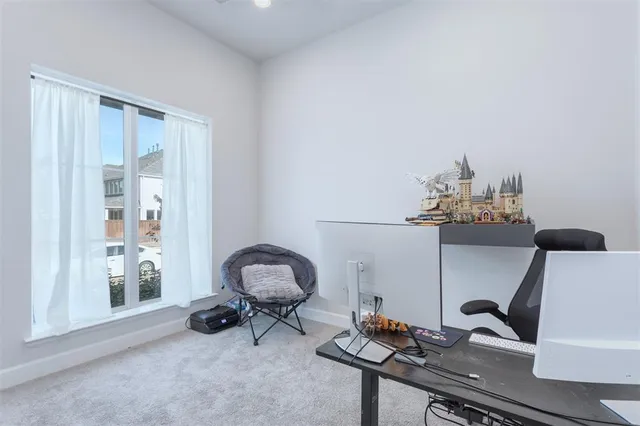 a room with a table and chairs