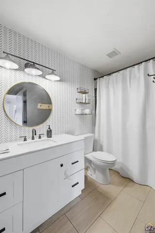 $299,500 | 6309 Southwest 28th Street, Topeka, KS 66614